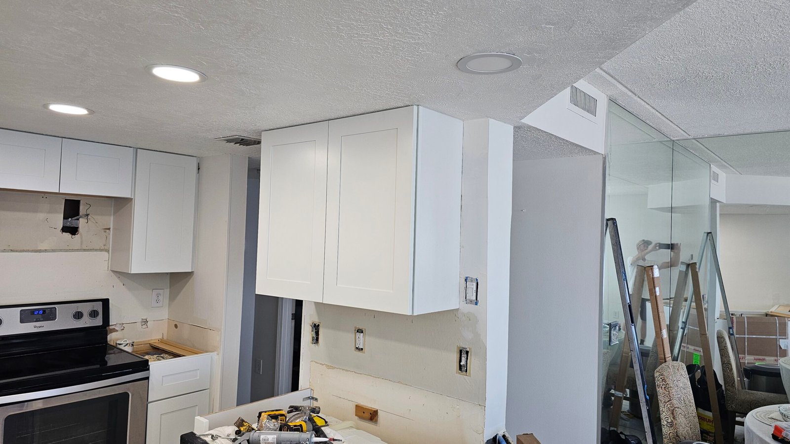 Contemporary Kitchen Lighting and Hardwood Floors in Volusia County - Florida's Handyman and Renovation Services