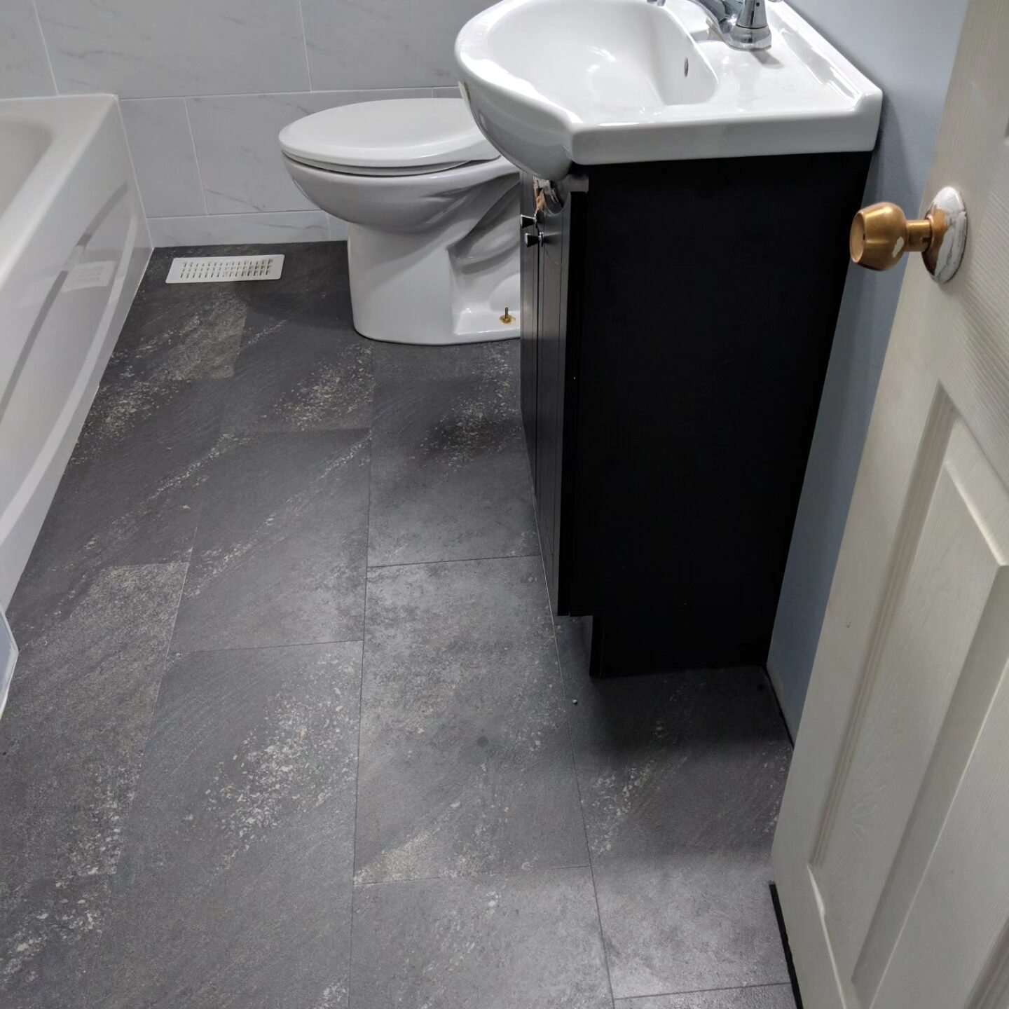 Tile Backsplash, Cabinet Installation, Handyman Repairs, Painting, and Flooring Services in Daytona Beach, Port Orange, Ormond Beach, New Smyrna Beach, Ponce Inlet, Volusia County.