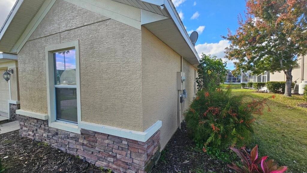 Freshly painted home exterior by professional contractors.