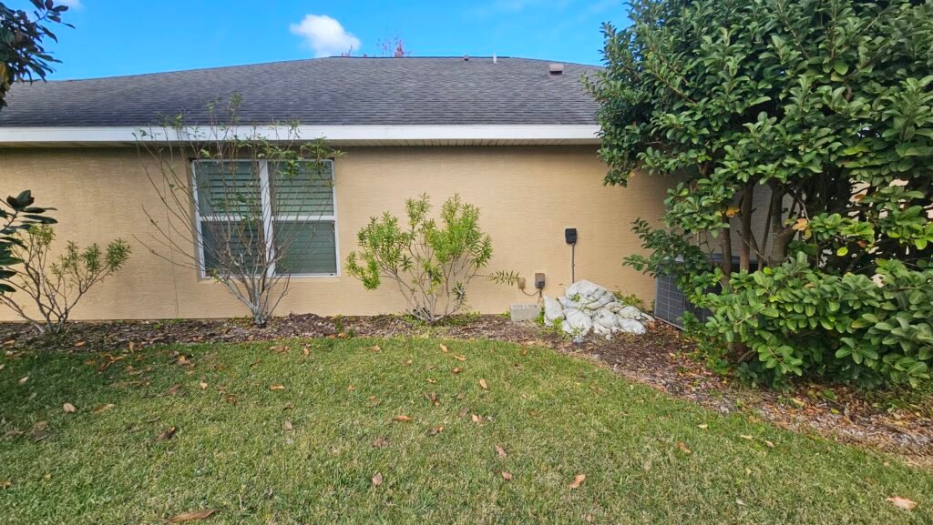 Professional exterior house painting and surface protection in Florida.