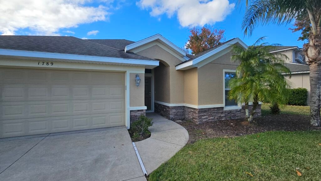 Residential exterior painting and protection in Florida.