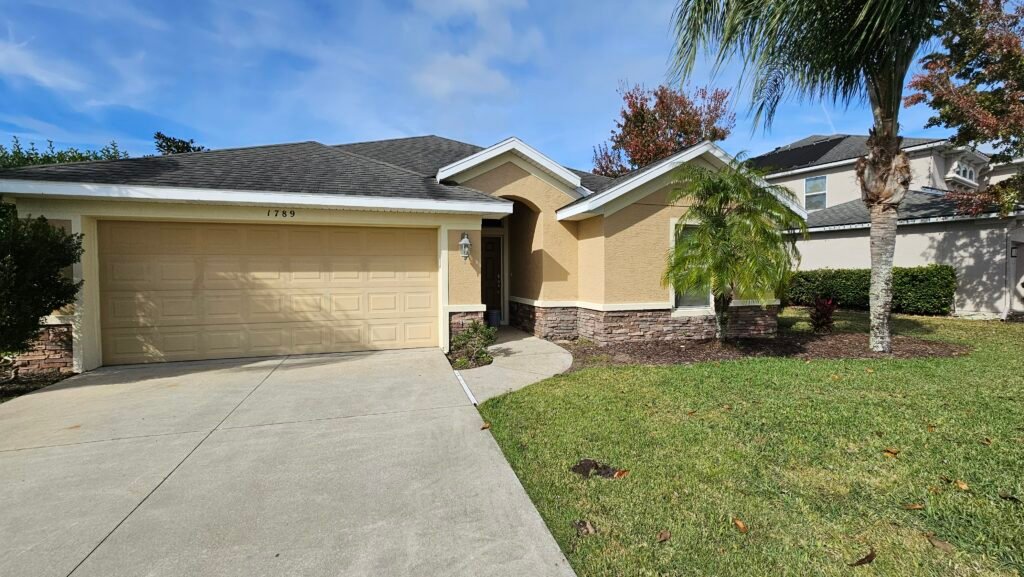 Complete exterior house painting and renovation in Florida.