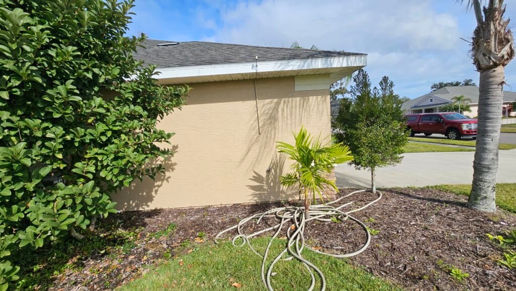 Complete exterior house painting and renovation in Florida.