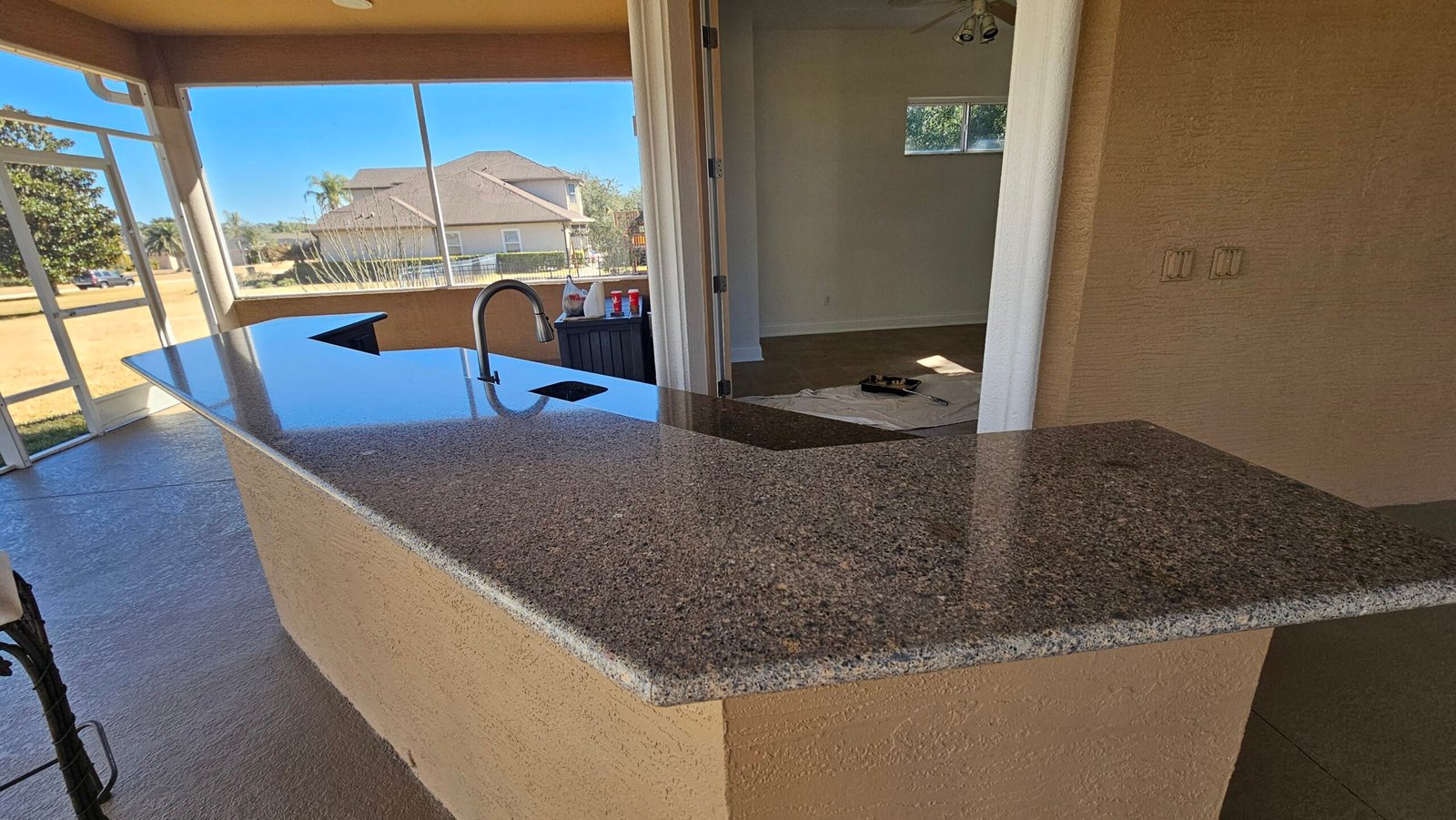 Modern kitchen renovation with custom tile backsplash in Daytona Beach - Florida's Handyman and Renovation Services