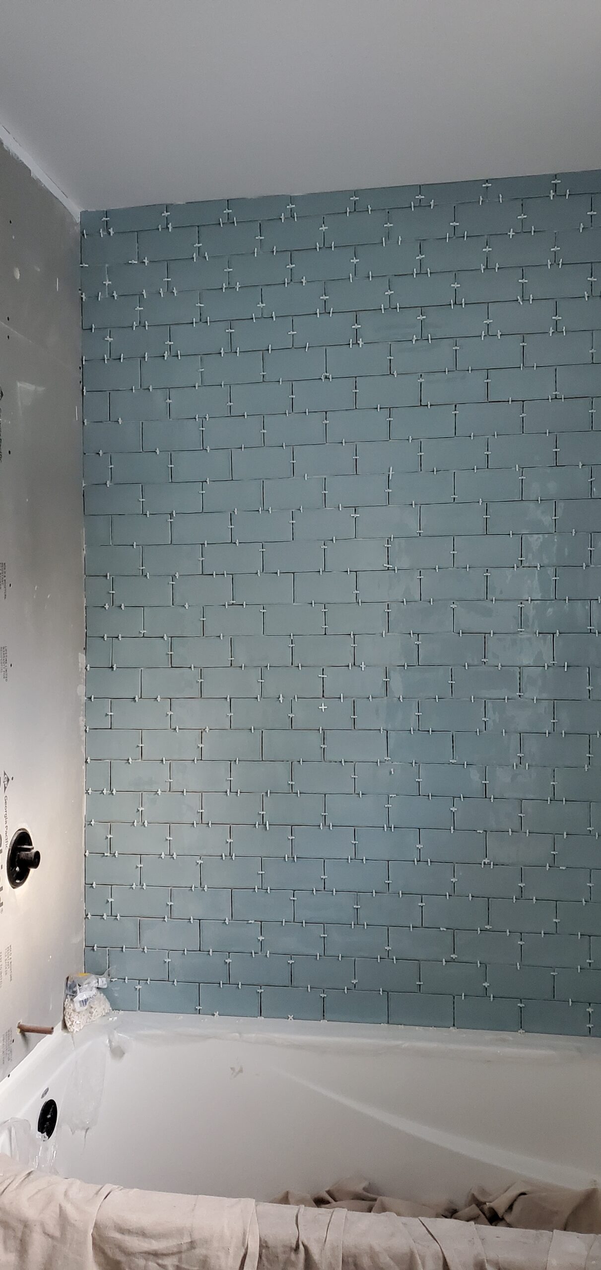 Modern bathroom remodeling with new tile and paint in Daytona Beach Shores Florida
