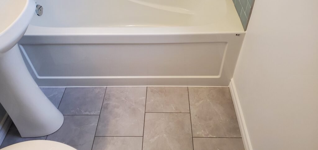 Custom bathroom renovation with new tile and paint in New Smyrna Beach Florida