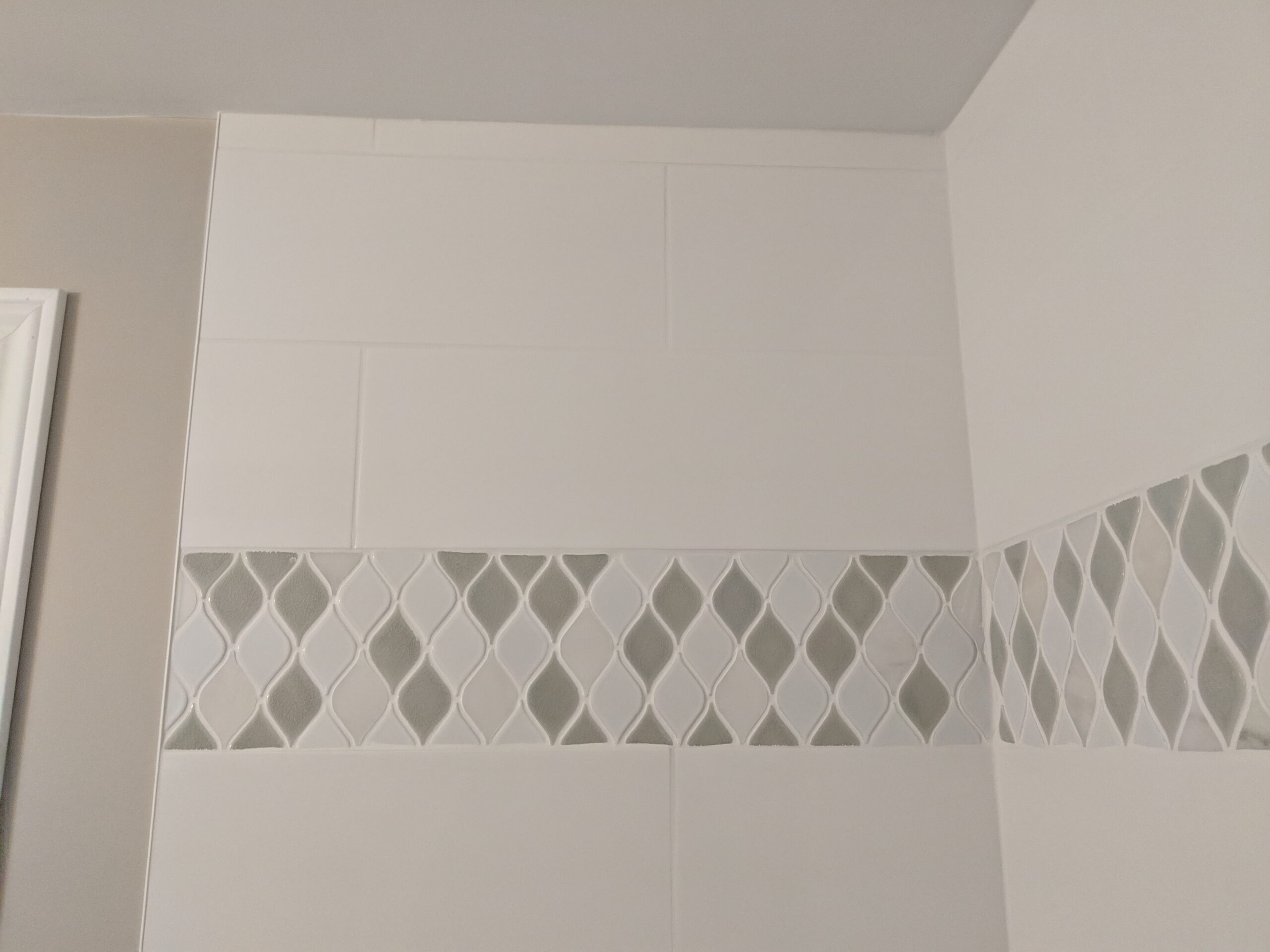 Bathroom renovation painting and tile work progress in Daytona Beach Shores Florida