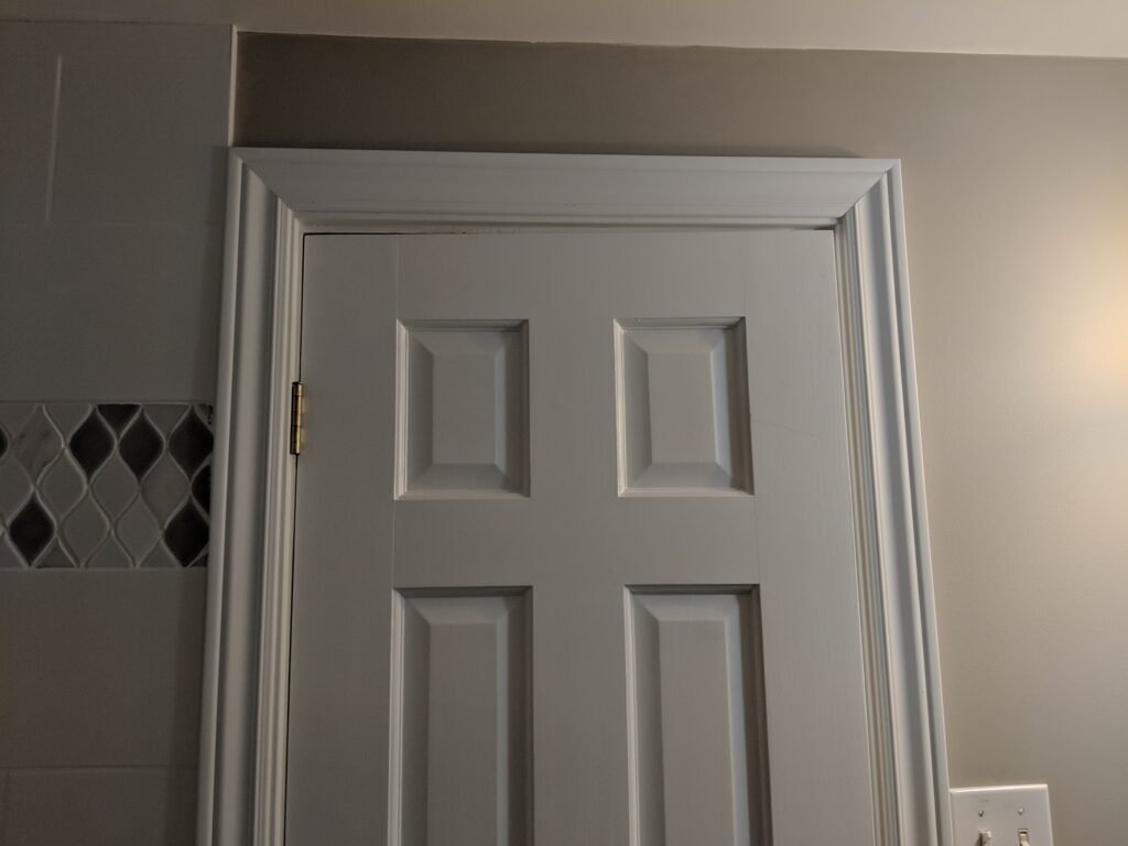 Modern bathroom remodeling with new tile and paint in Daytona Beach Shores Florida