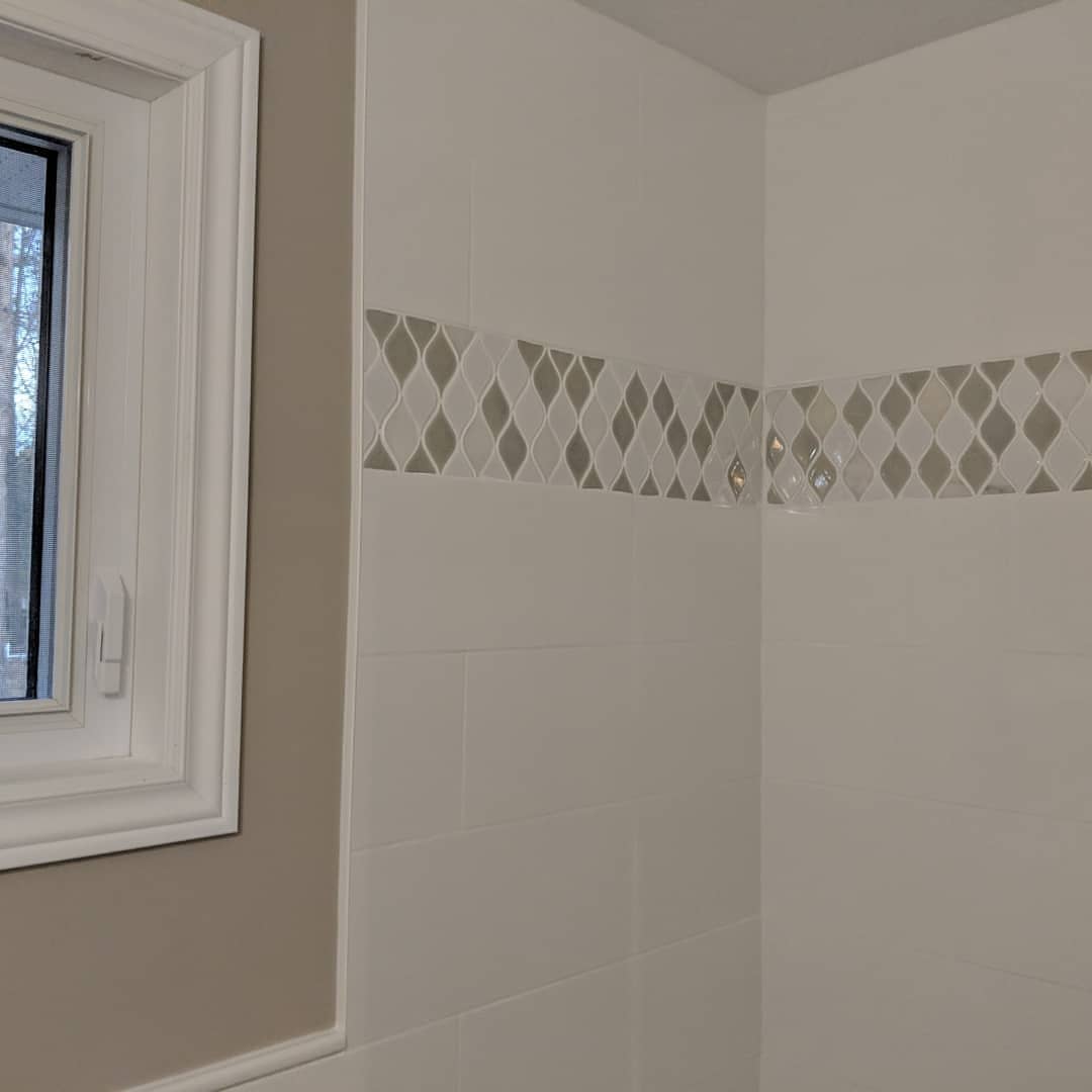 Custom bathroom renovation with new tile and paint in South Daytona Florida