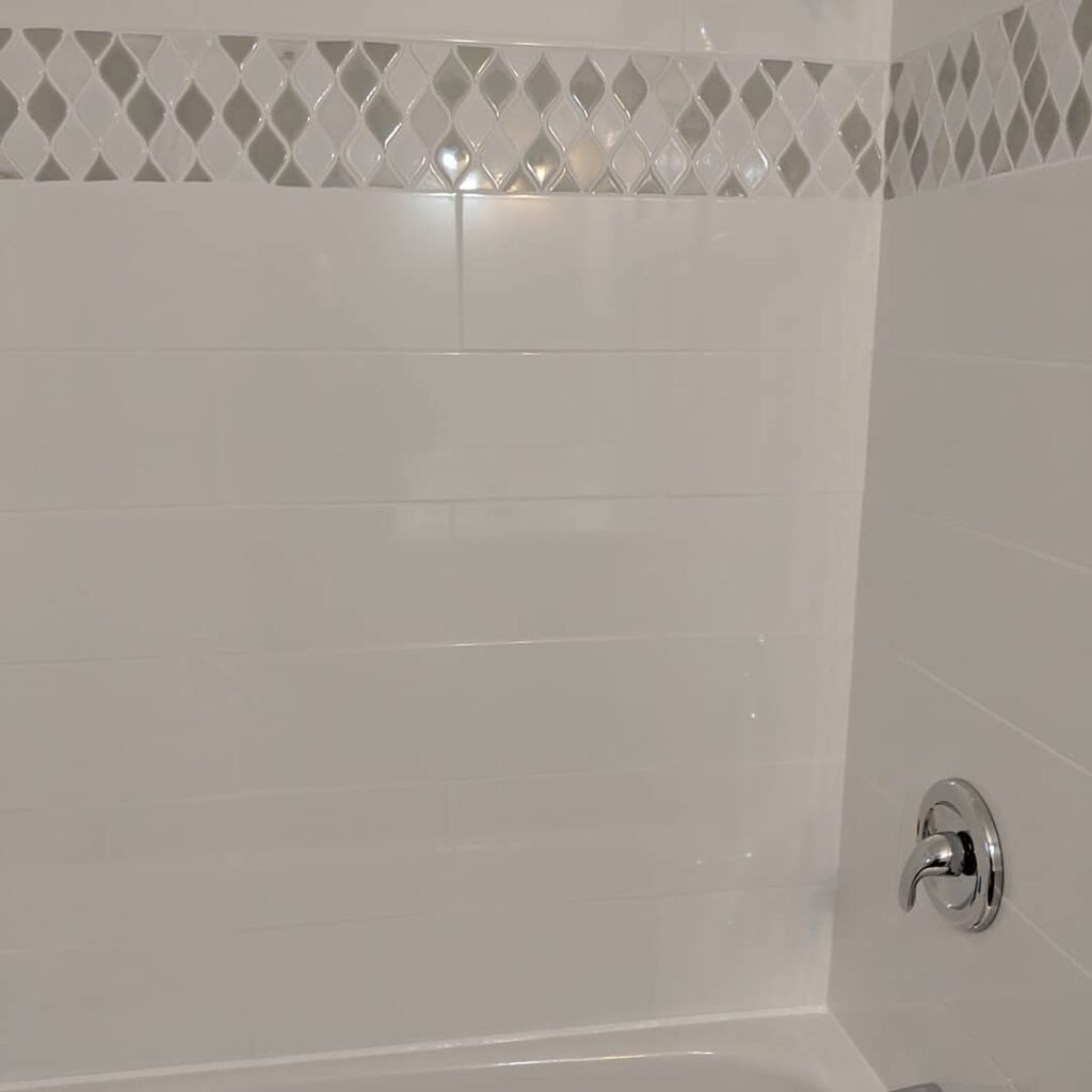 Modern bathroom remodeling with new tile and paint in Daytona Beach Florida