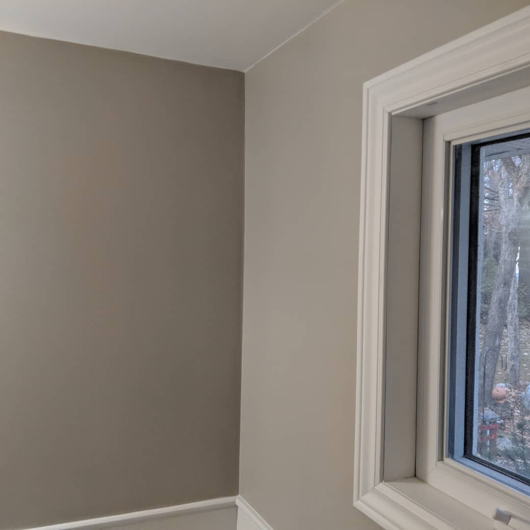 Modern bathroom remodeling with new tile and paint in Daytona Beach Shores Florida