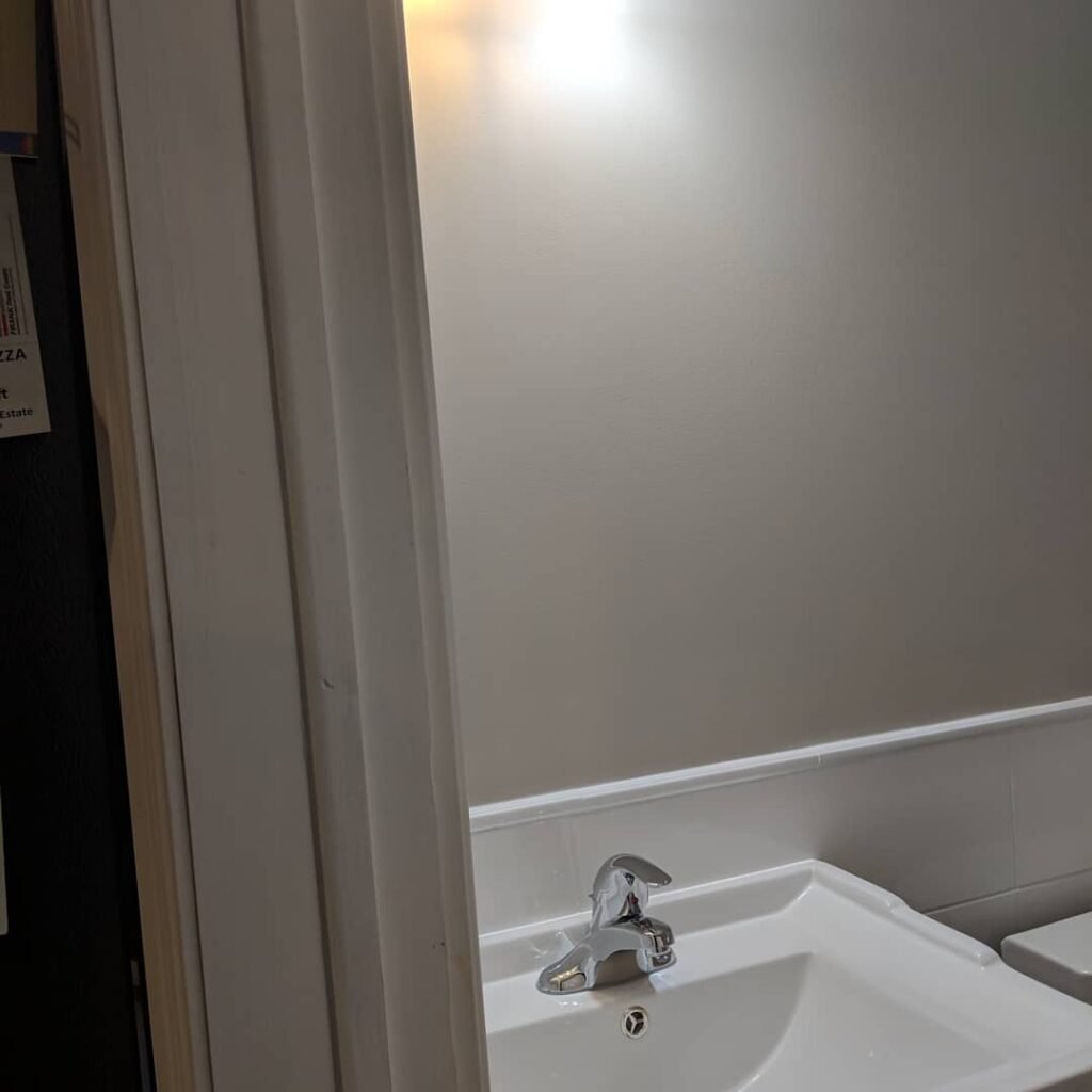 Custom bathroom renovation with new tile and paint in New Smyrna Beach Florida