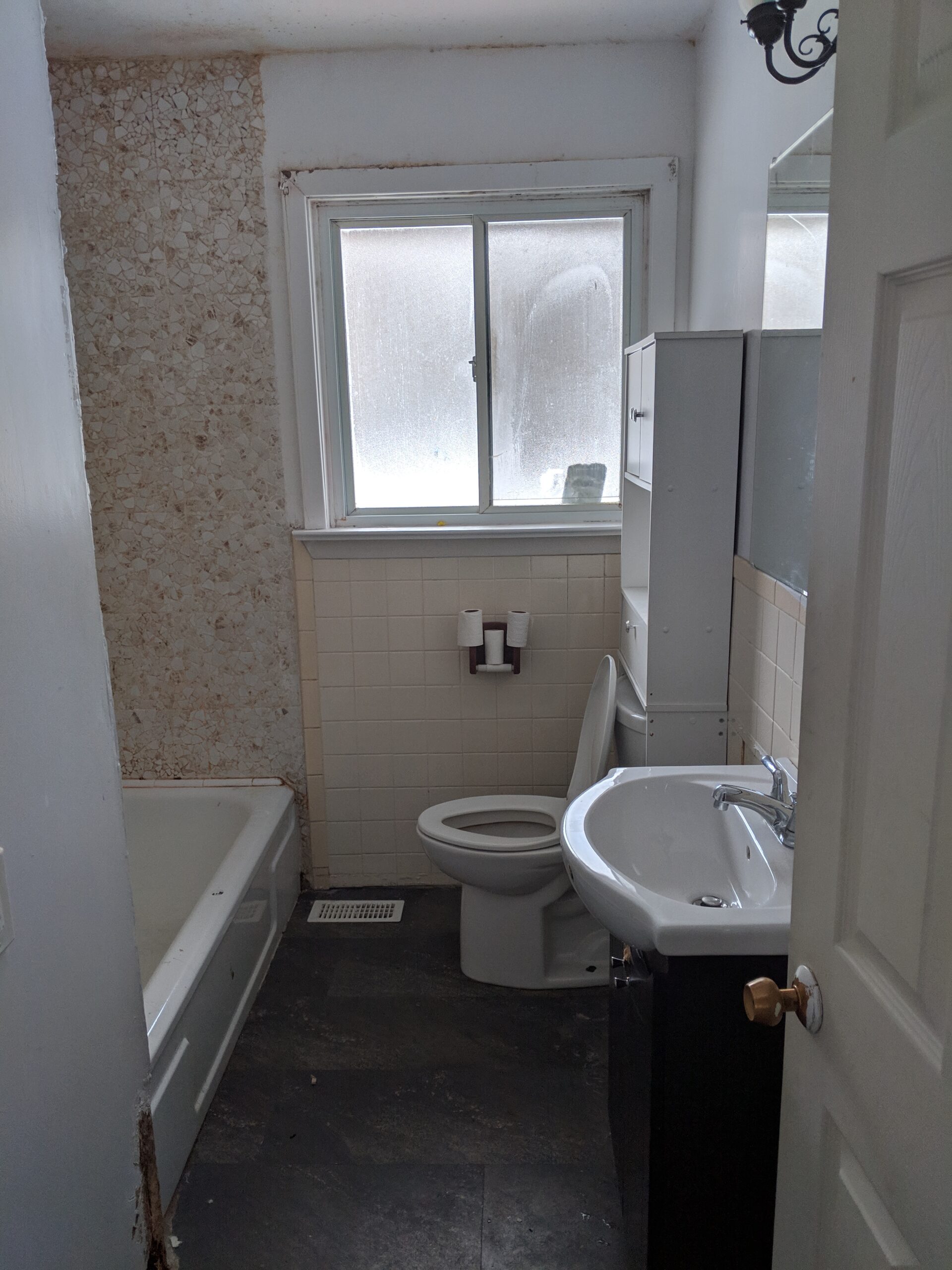 Modern bathroom remodeling with new tile and paint in Daytona Beach Florida