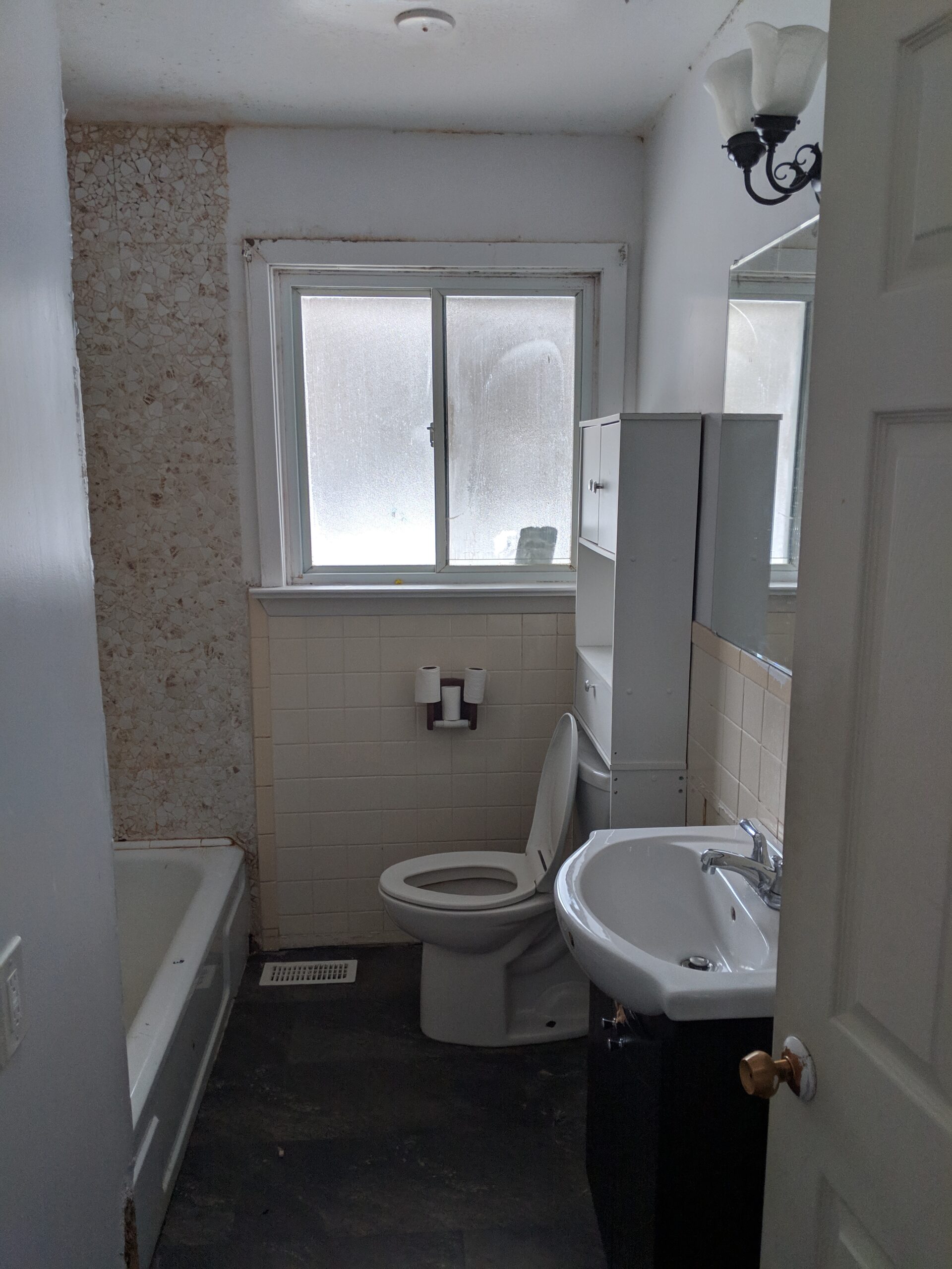 Custom bathroom renovation with new tile and paint in South Daytona Florida