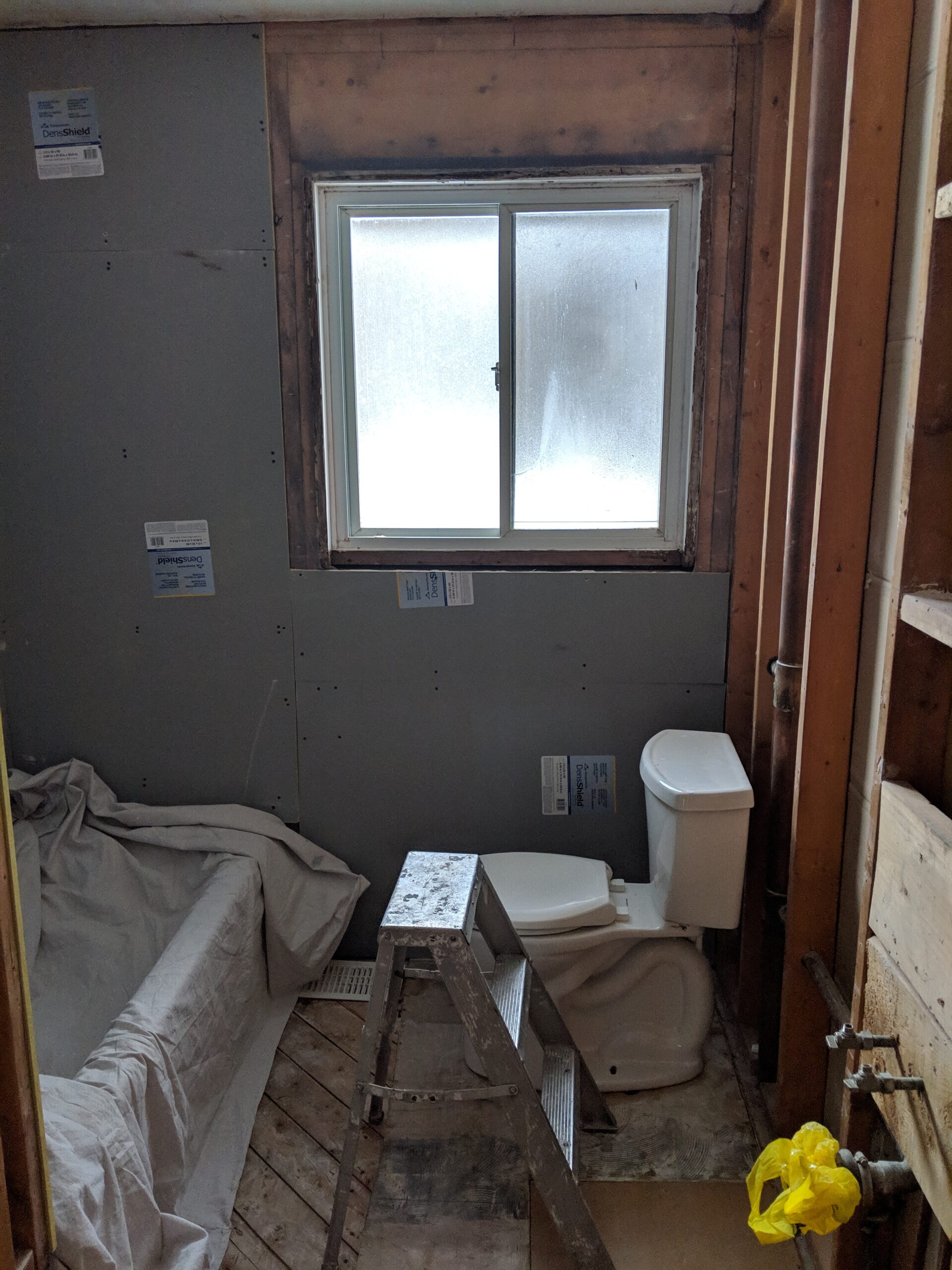 Modern bathroom remodeling with new tile and paint in Daytona Beach Shores Florida
