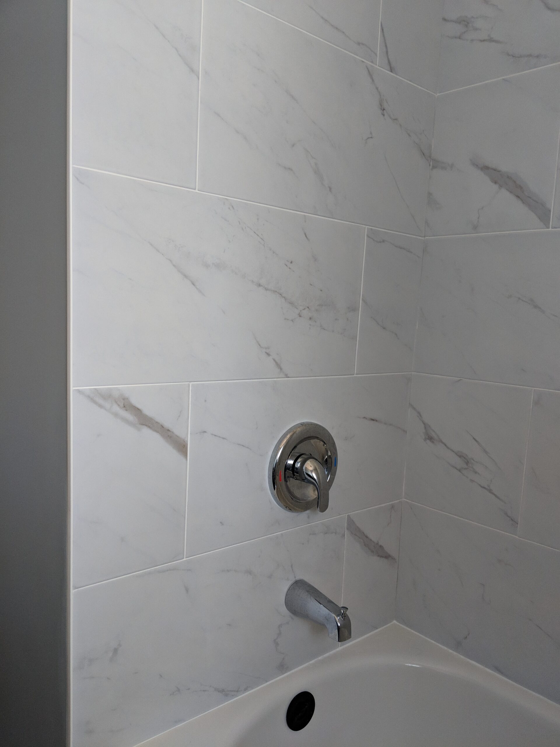 Custom bathroom renovation with new tile and paint in New Smyrna Beach Florida