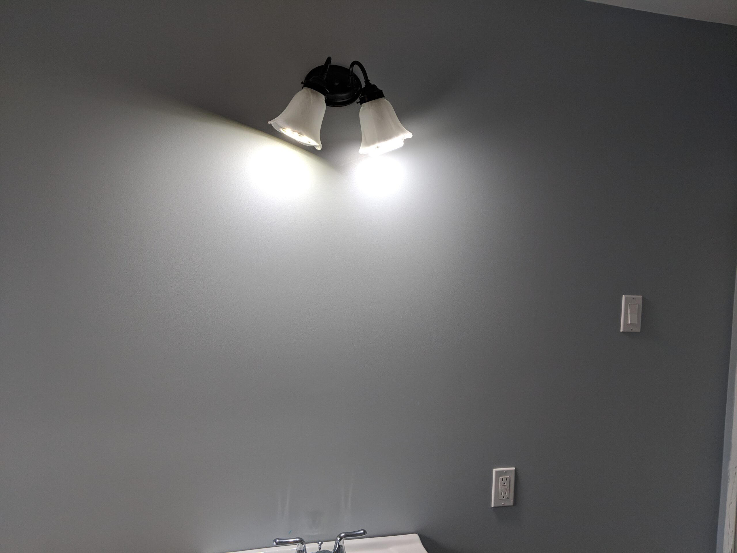 Modern bathroom remodeling with new tile and paint in Daytona Beach Florida
