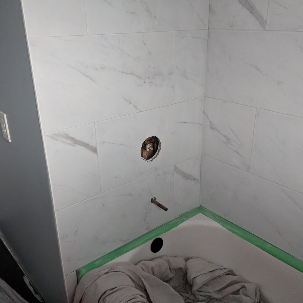 Modern bathroom remodeling with new tile and paint in Daytona Beach Shores Florida