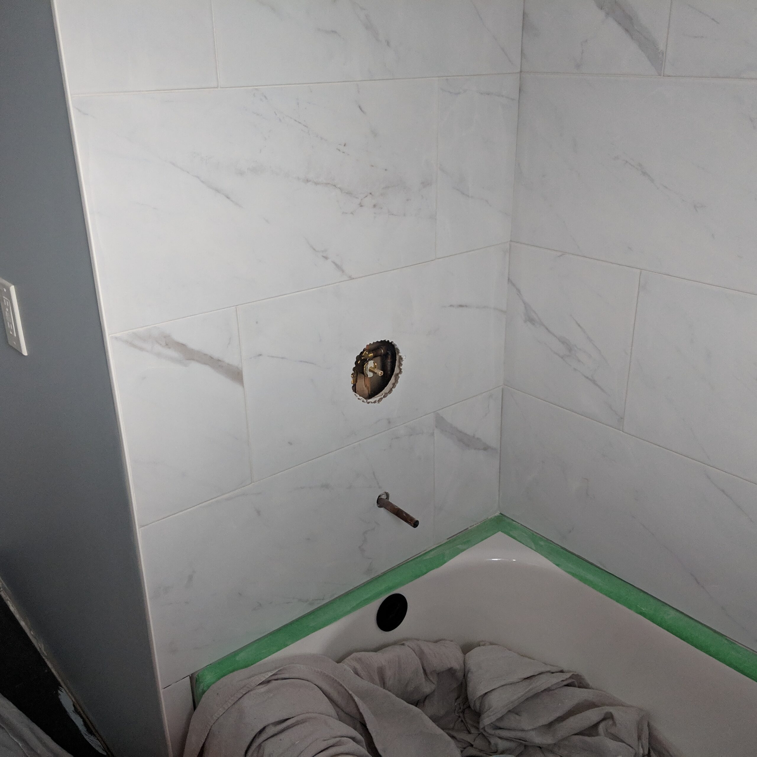 Modern bathroom remodeling with new tile and paint in Daytona Beach Shores Florida