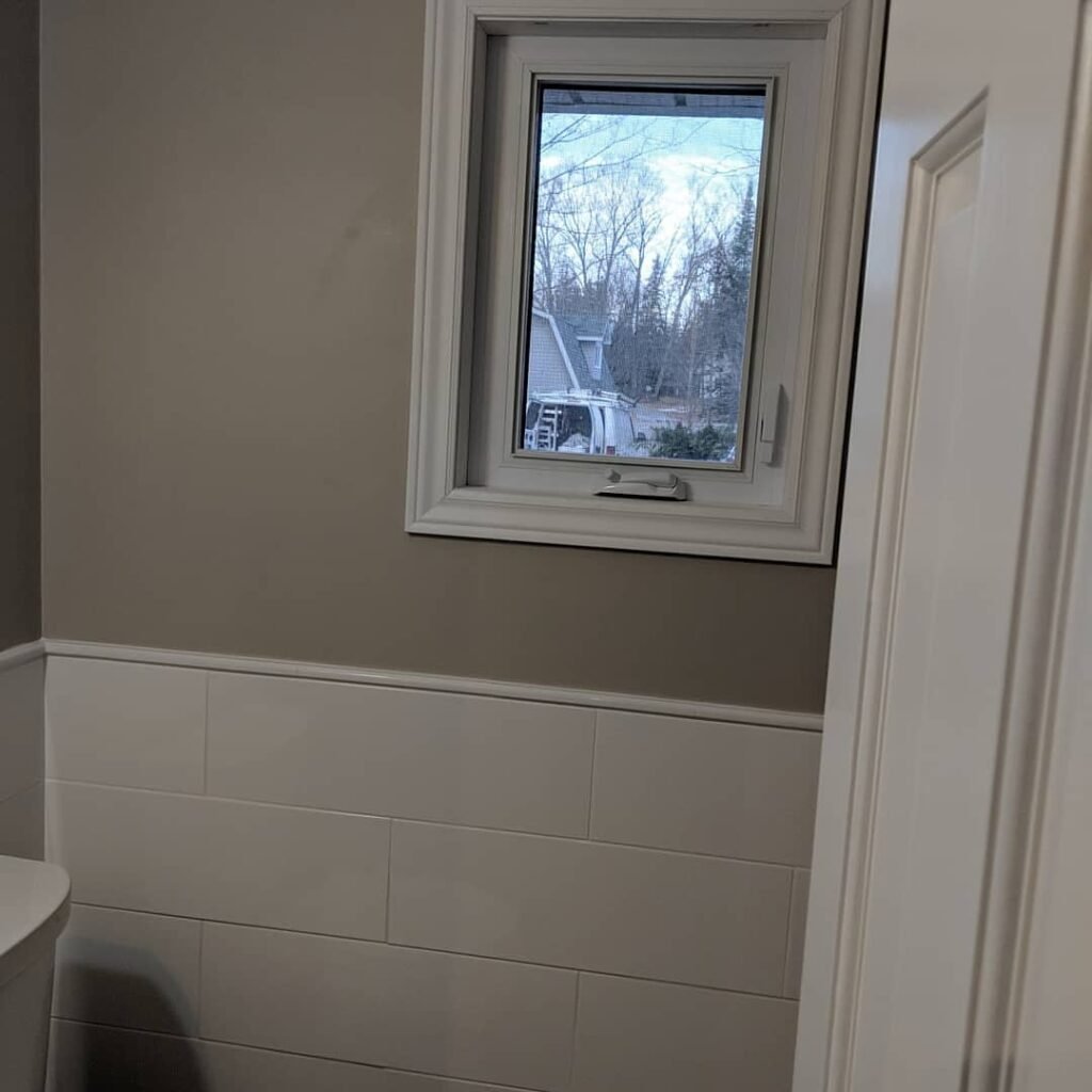 Custom bathroom renovation with new tile and paint in South Daytona Florida