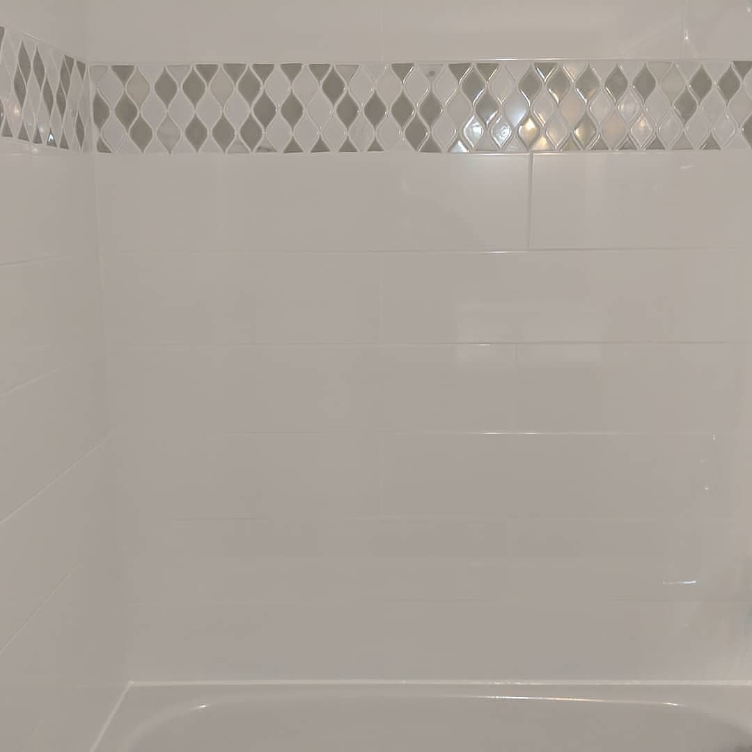 Modern bathroom remodeling with new tile and paint in Daytona Beach Florida