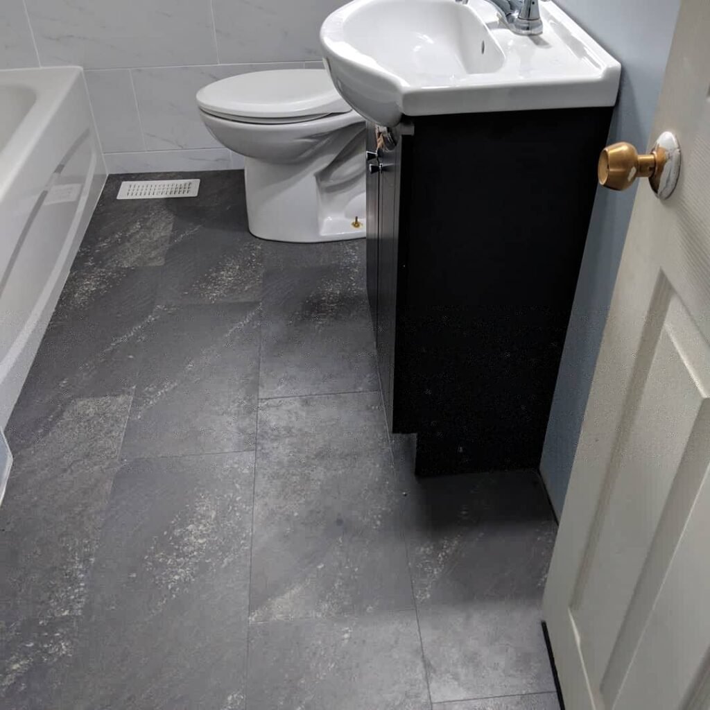 Modern bathroom remodeling with new tile and paint in Daytona Beach Shores Florida