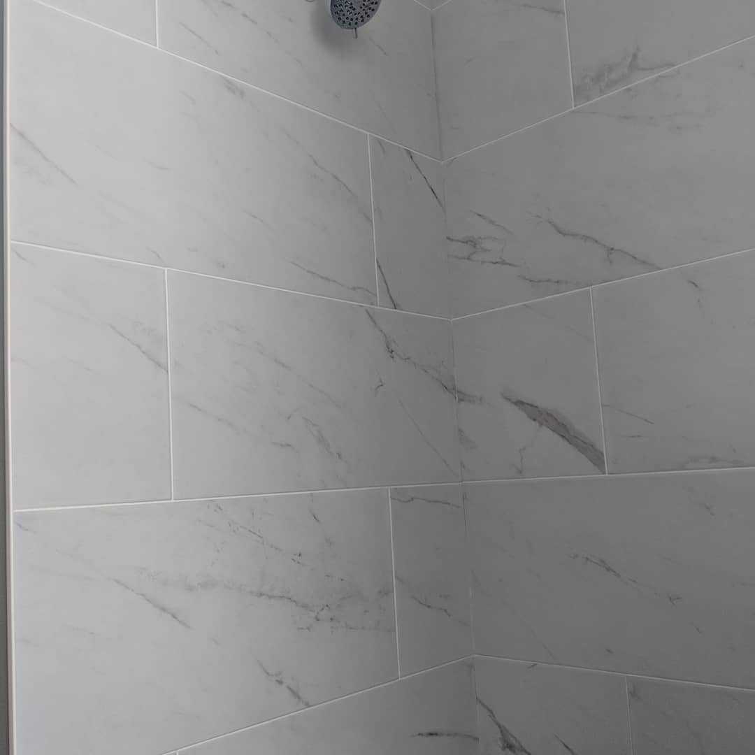 Custom bathroom renovation with new tile and paint in South Daytona Florida