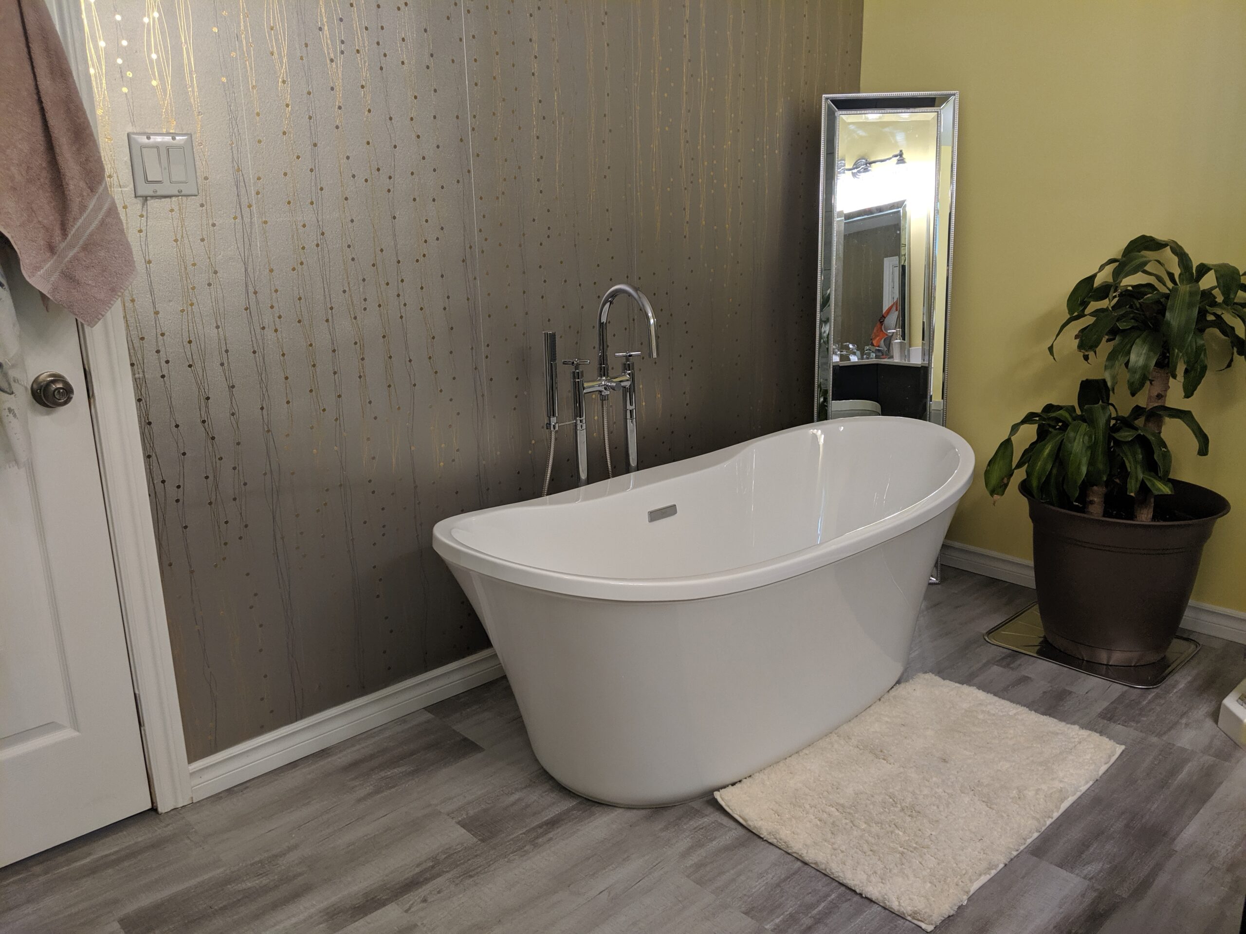 Modern bathroom remodeling with new tile and paint in Daytona Beach Florida