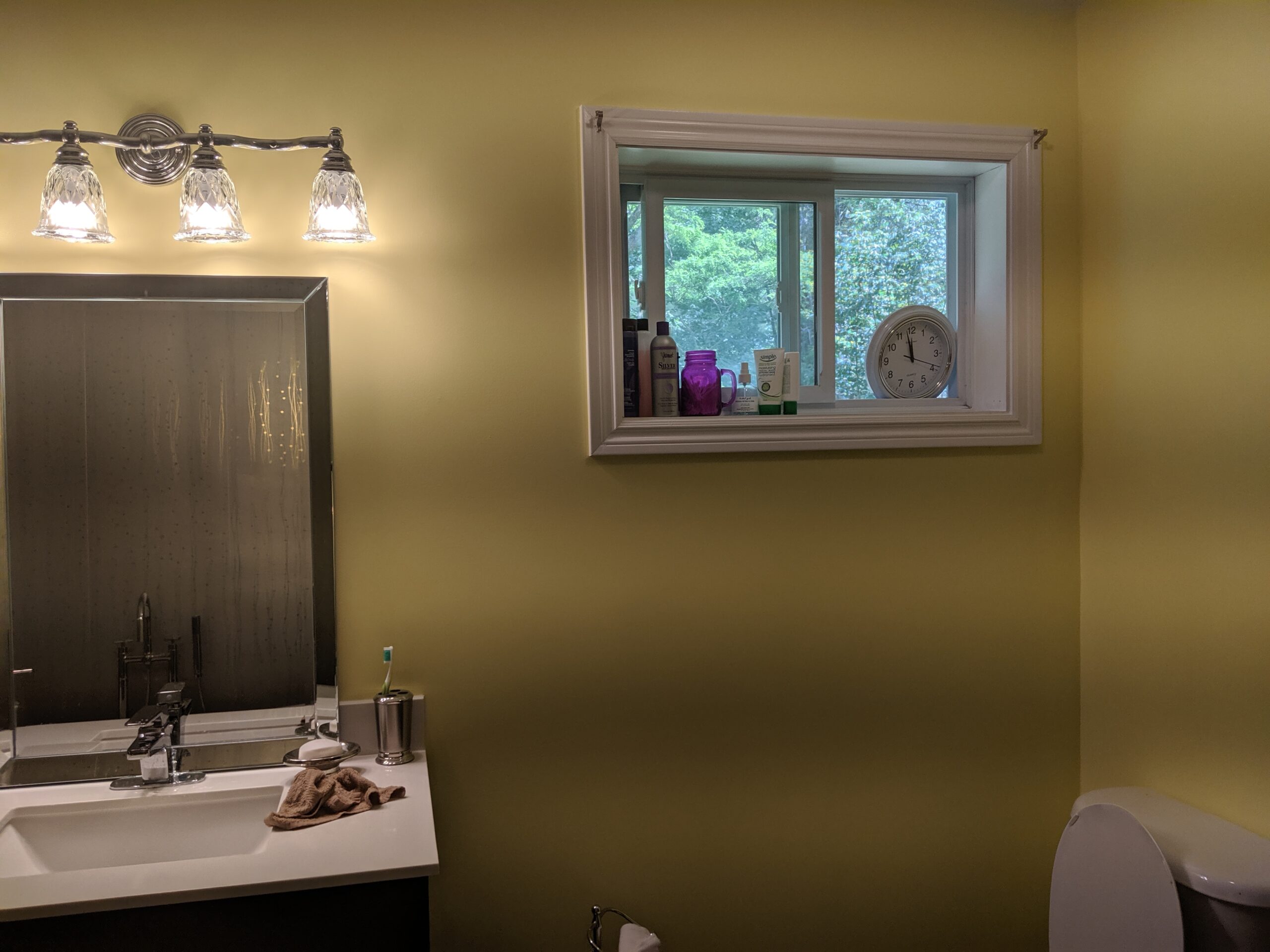 Modern bathroom remodeling with new tile and paint in Daytona Beach Shores Florida
