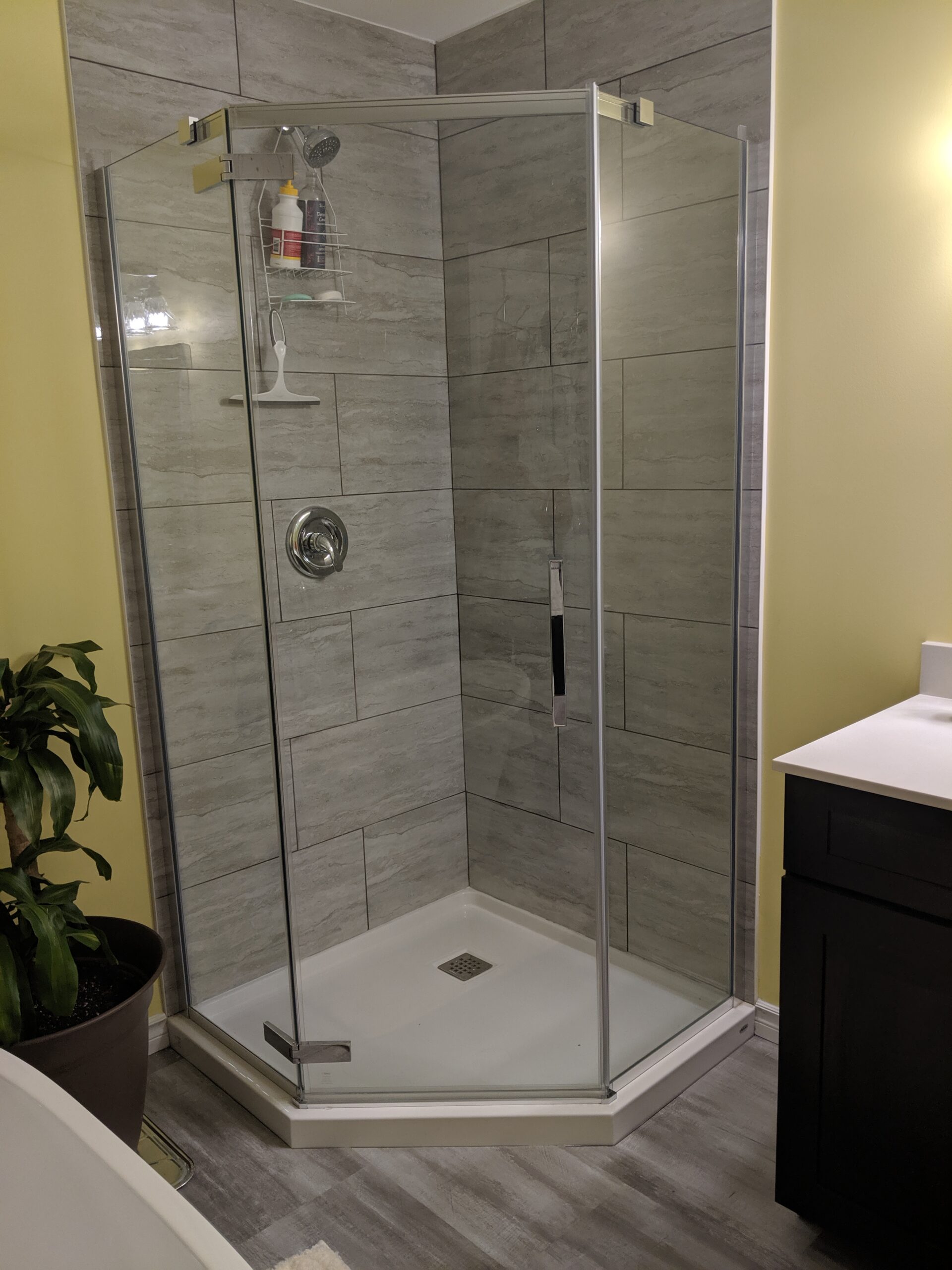 Custom bathroom renovation with new tile and paint in South Daytona Florida