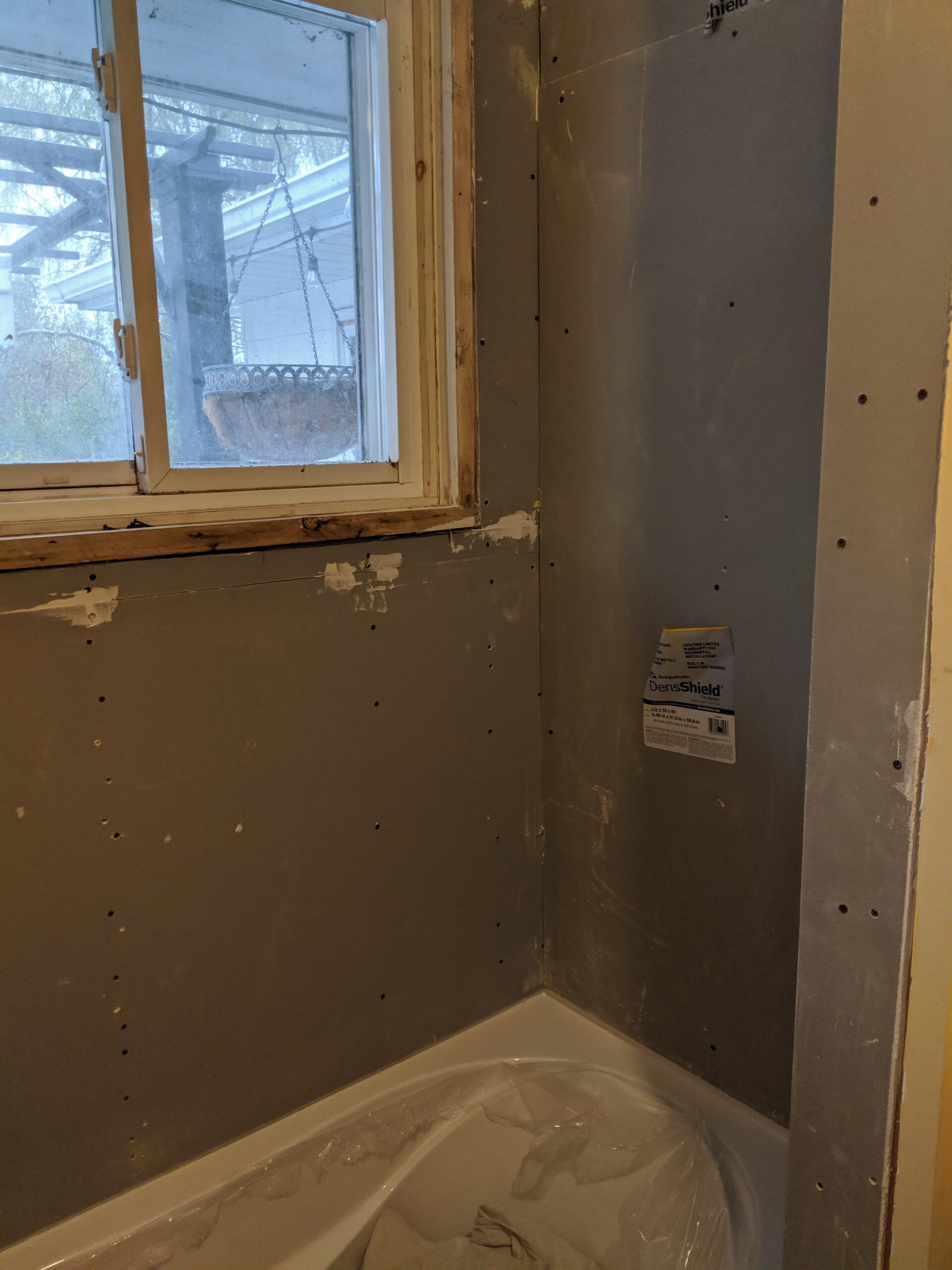 Custom bathroom renovation with new tile and paint in South Daytona Florida