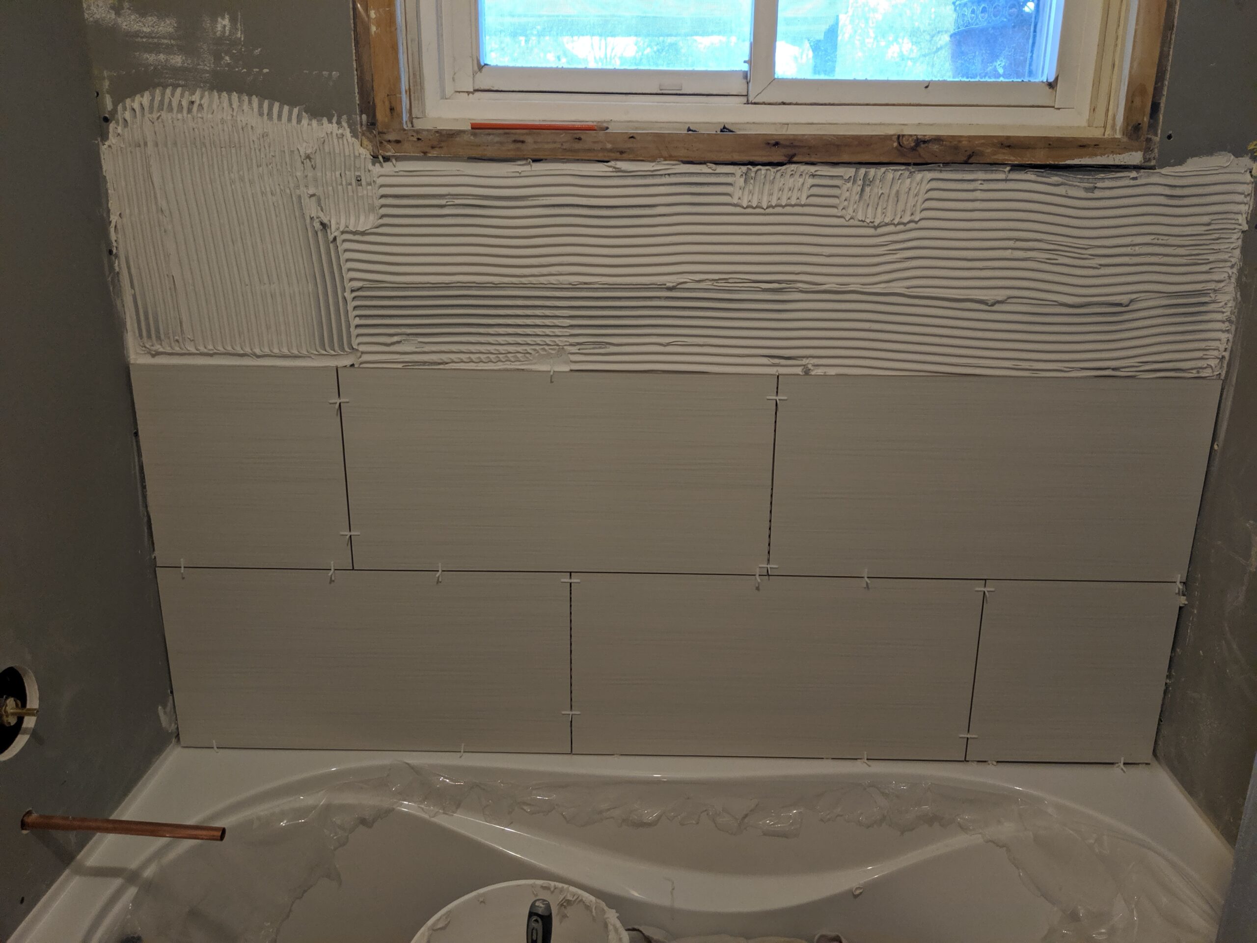 Custom bathroom renovation with new tile and paint in New Smyrna Beach Florida