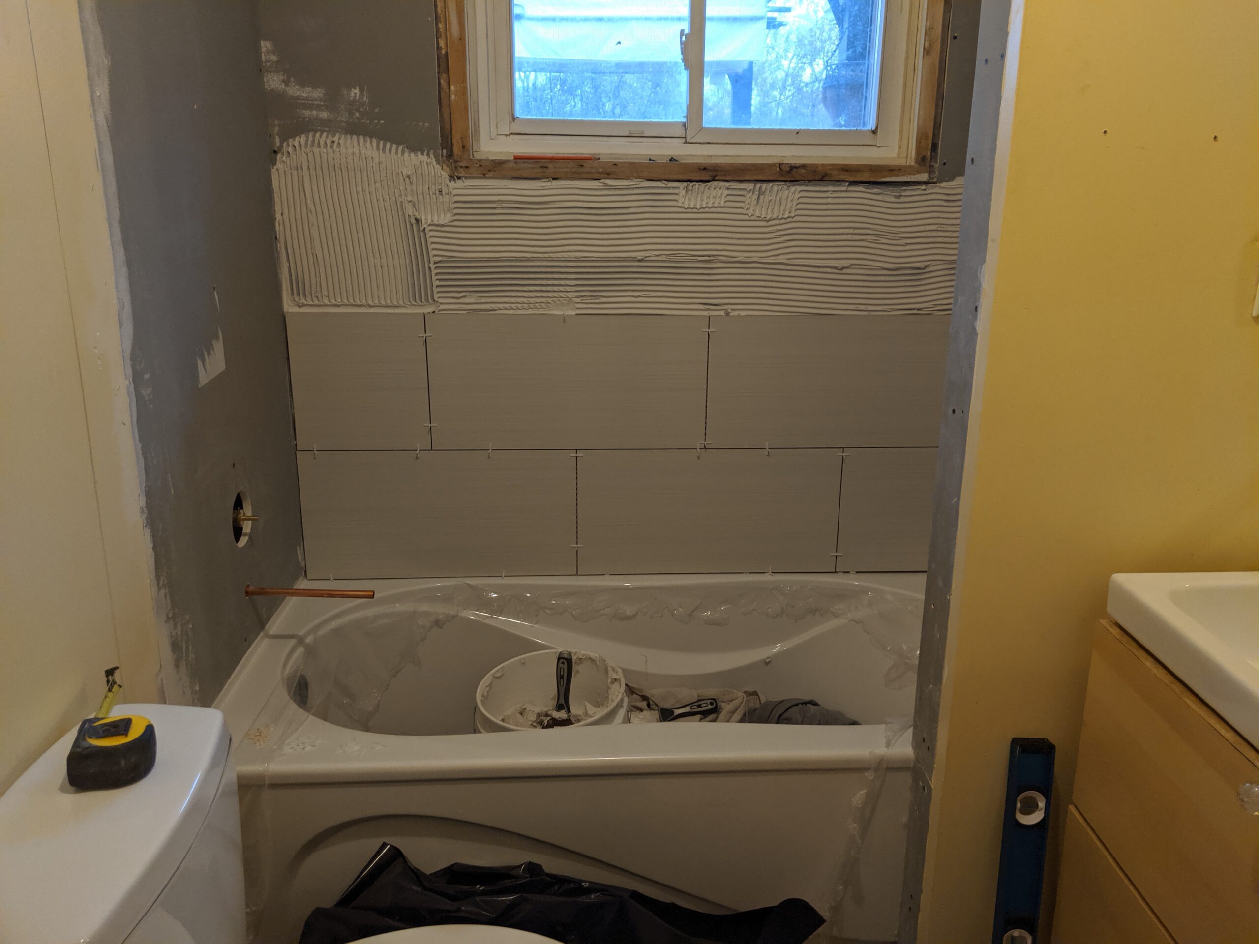 Modern bathroom remodeling with new tile and paint in Daytona Beach Shores Florida