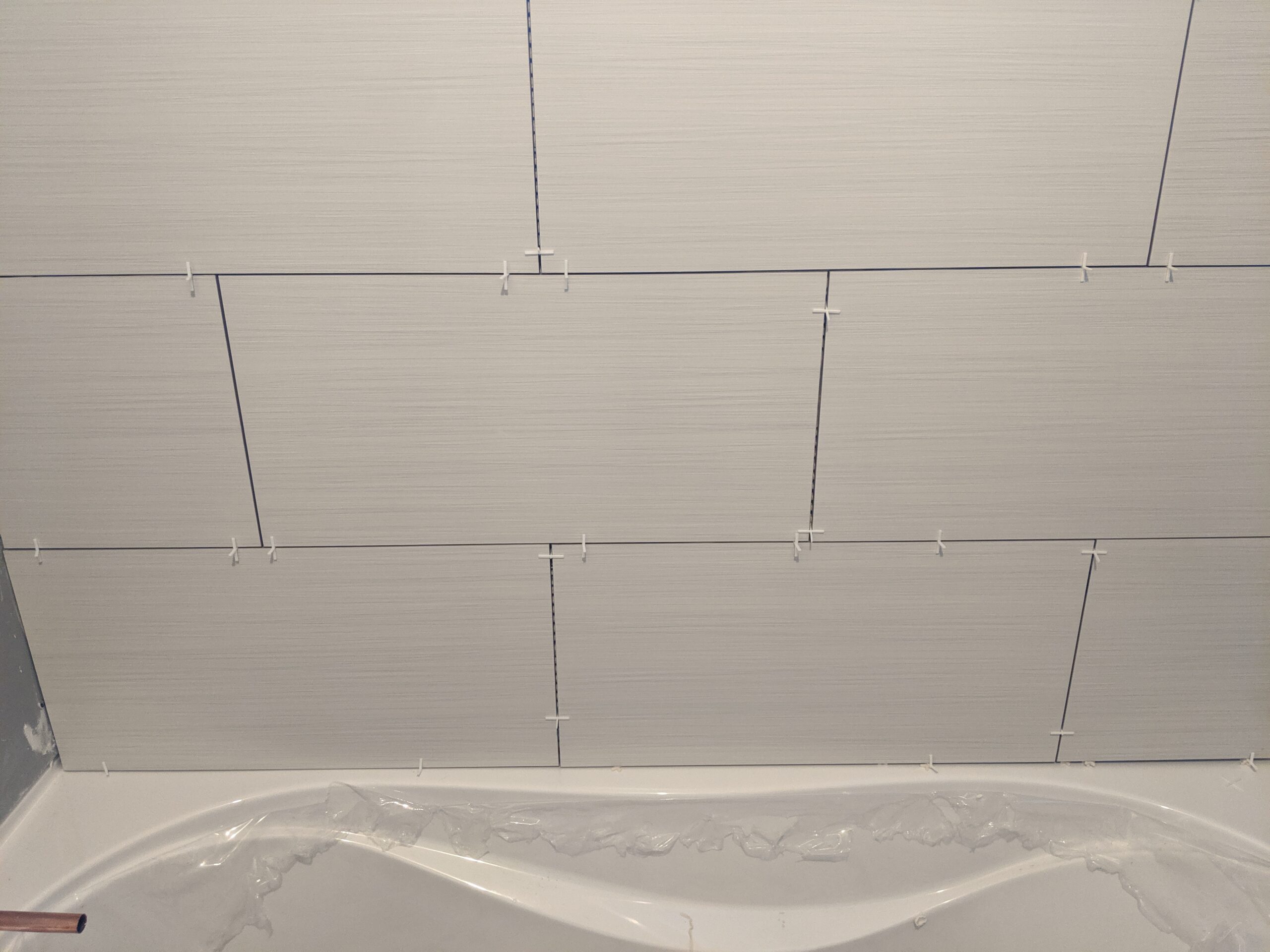 Modern bathroom remodeling with new tile and paint in Daytona Beach Florida