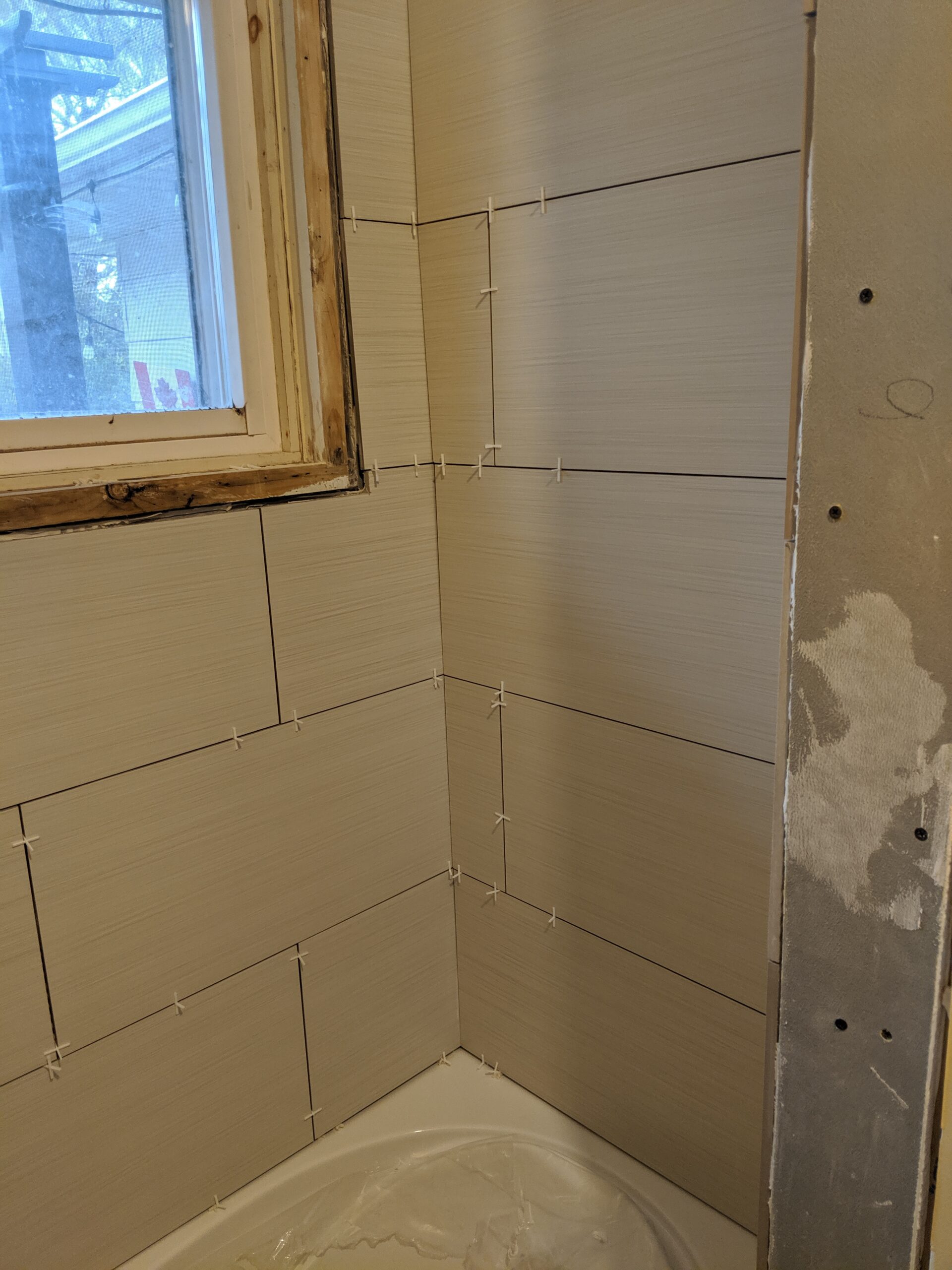 Custom bathroom renovation with new tile and paint in South Daytona Florida