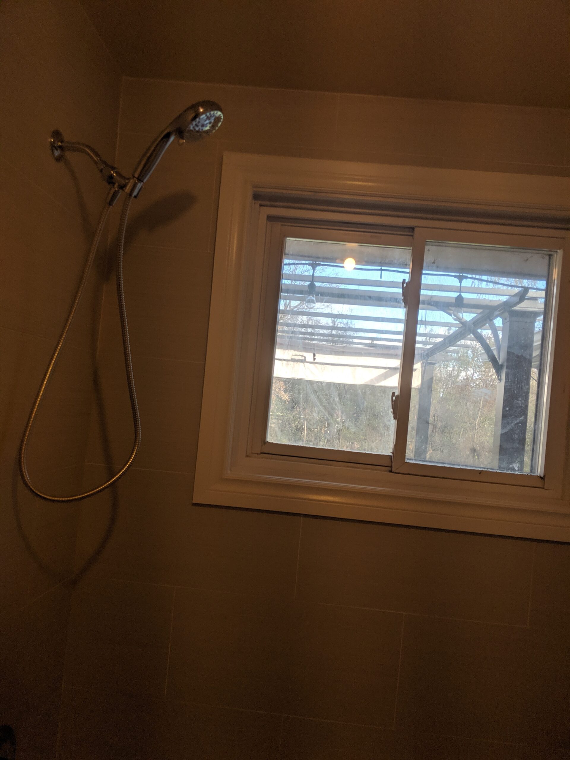 Modern bathroom remodeling with new tile and paint in Daytona Beach Shores Florida