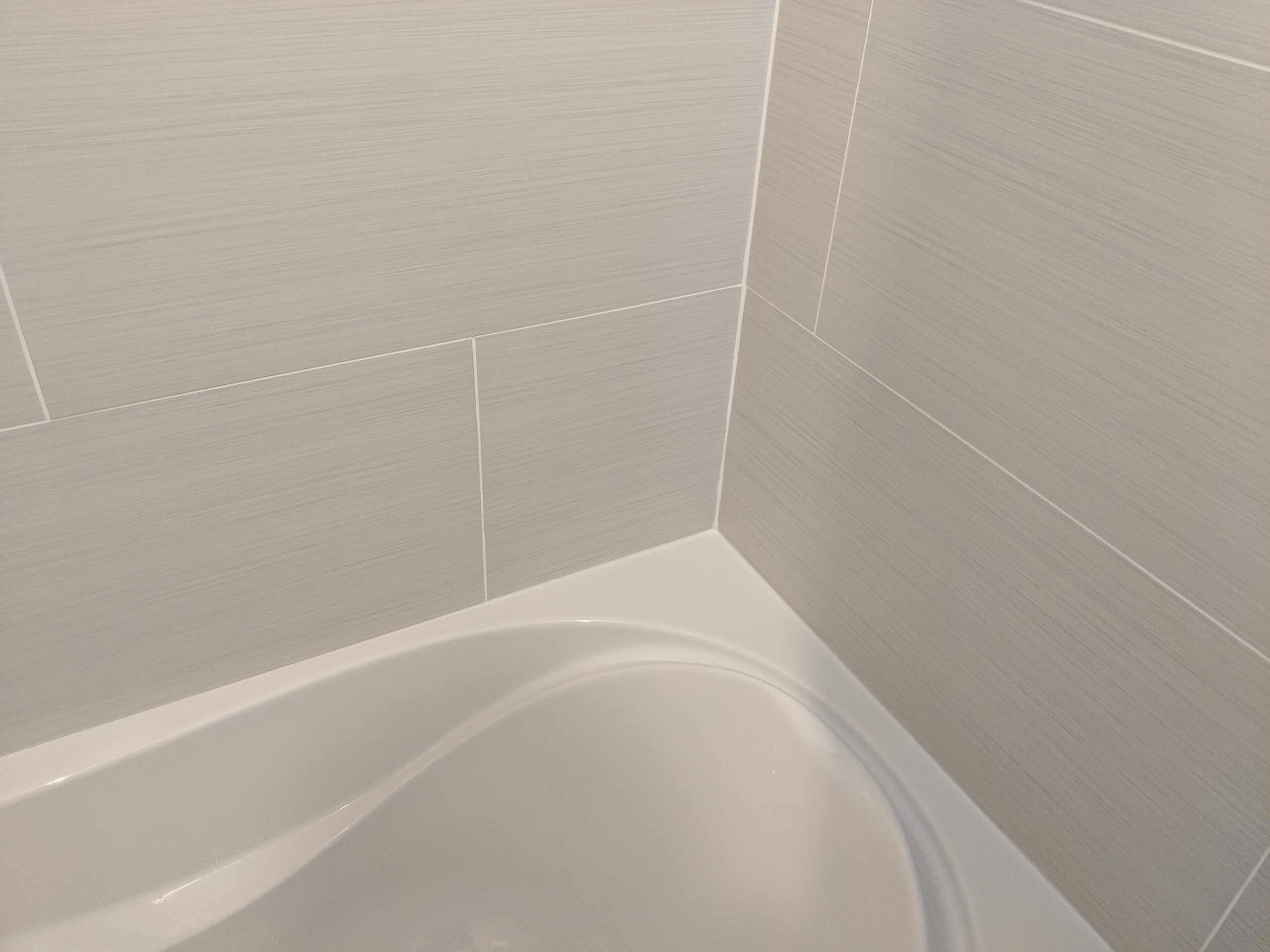 Modern bathroom remodeling with new tile and paint in Daytona Beach Florida