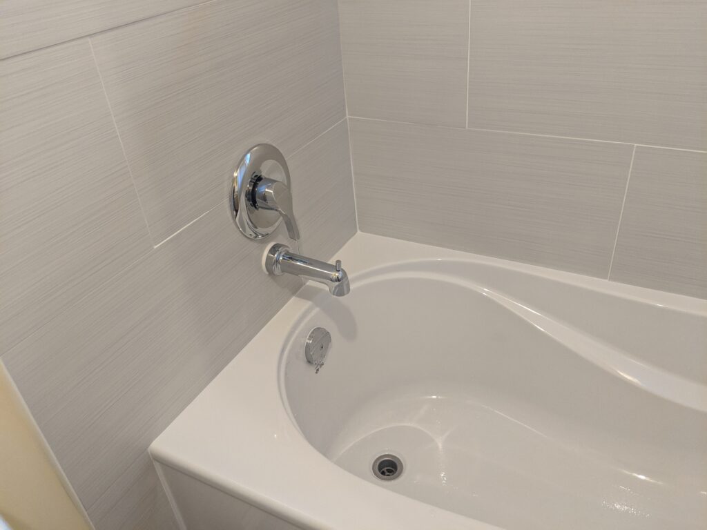 Custom bathroom renovation with new tile and paint in New Smyrna Beach Florida