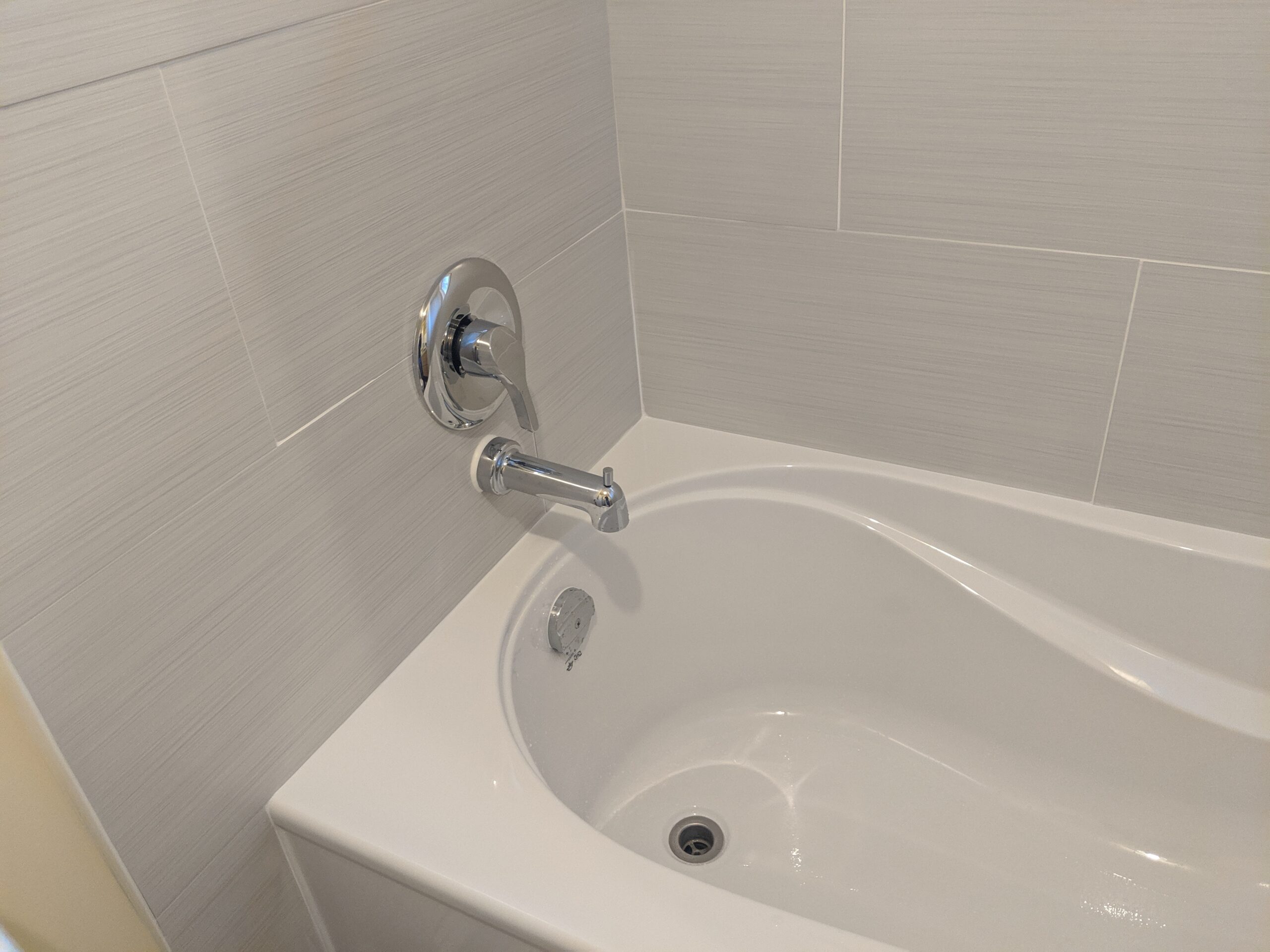 Custom bathroom renovation with new tile and paint in New Smyrna Beach Florida