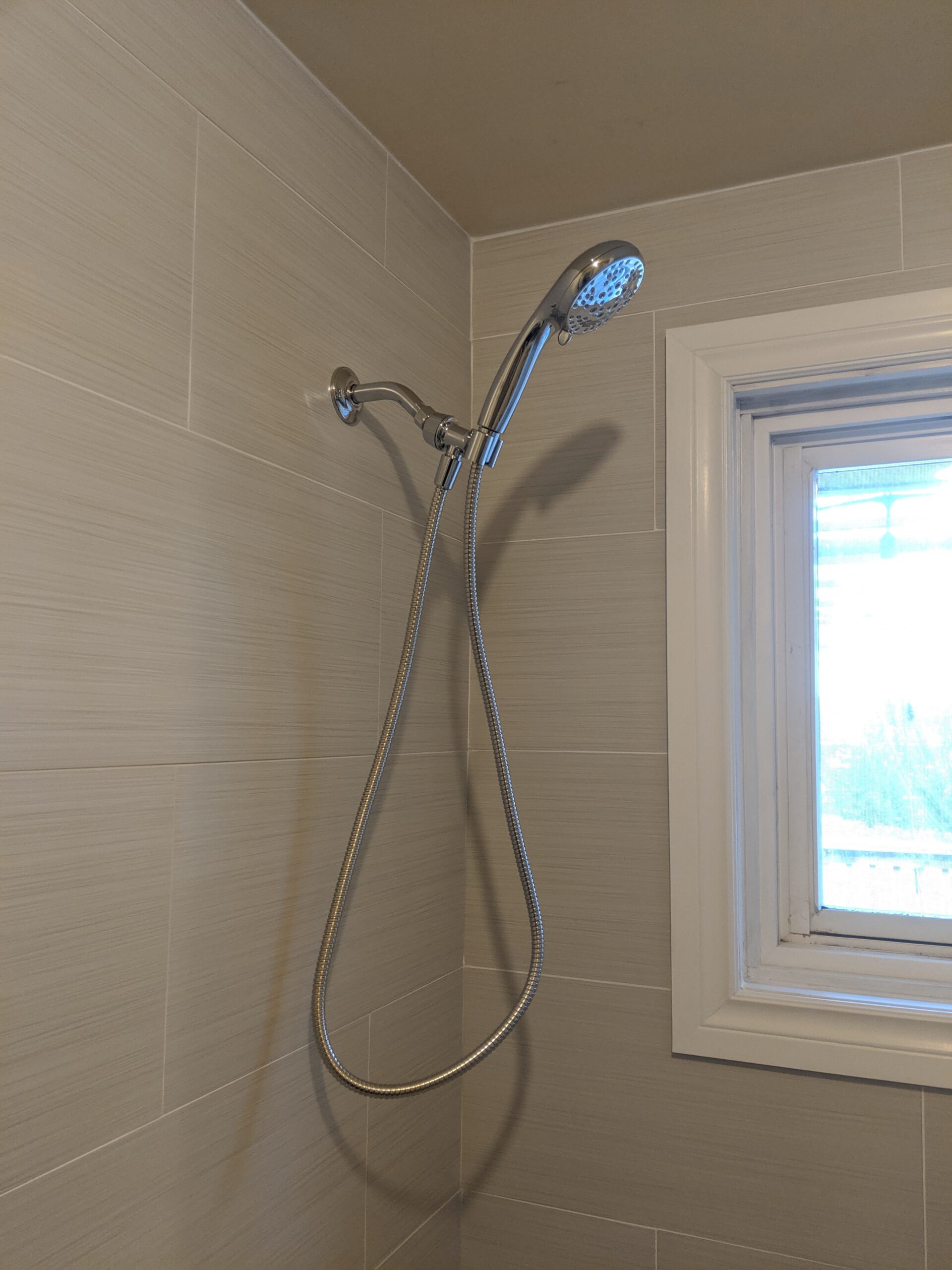 Custom bathroom renovation with new tile and paint in South Daytona Florida