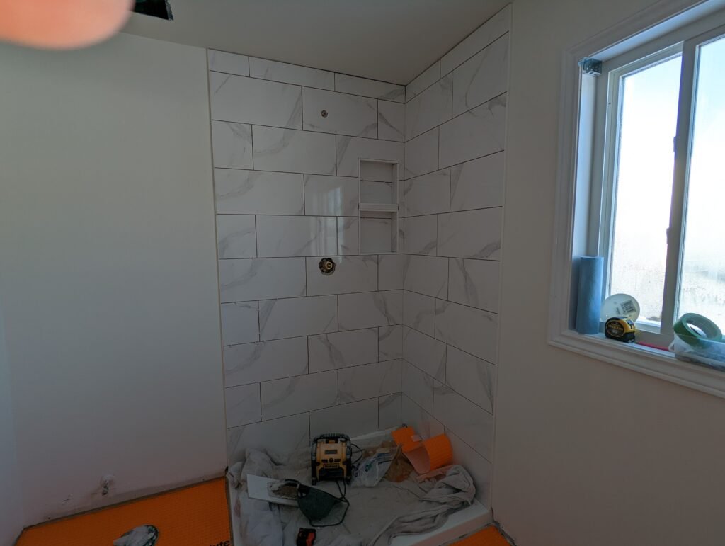 Modern bathroom remodeling with new tile and paint in Daytona Beach Florida