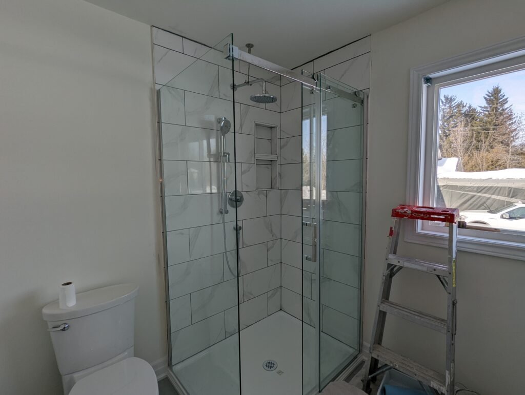 Custom bathroom renovation with new tile and paint in New Smyrna Beach Florida