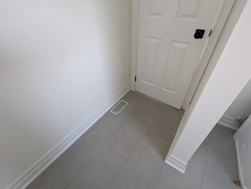 Modern bathroom remodeling with new tile and paint in Daytona Beach Shores Florida